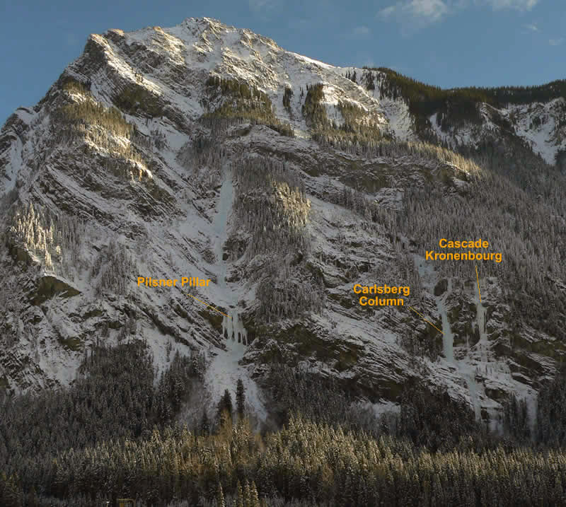 An early season photo of Mount Dennis (Dec 11 2005), showing Pilsner Pillar (215 m III, Wl 6), Carlsberg Column (60 m III. Wl 5), and Cascade Kronenbourg (90 m III, Wl 6).