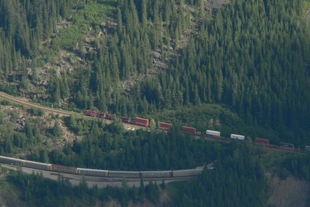 A train circles over itself at the Spiral Tunnels